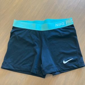 Nike Pro black with teal athletic shorts